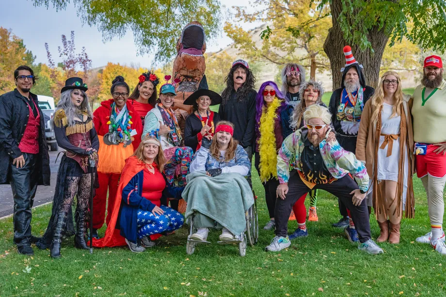 The Ultrabuds squad gathered together in colorful costumes